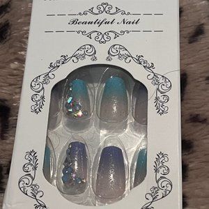Lots of different sets of false nails 24pc with stickers and file